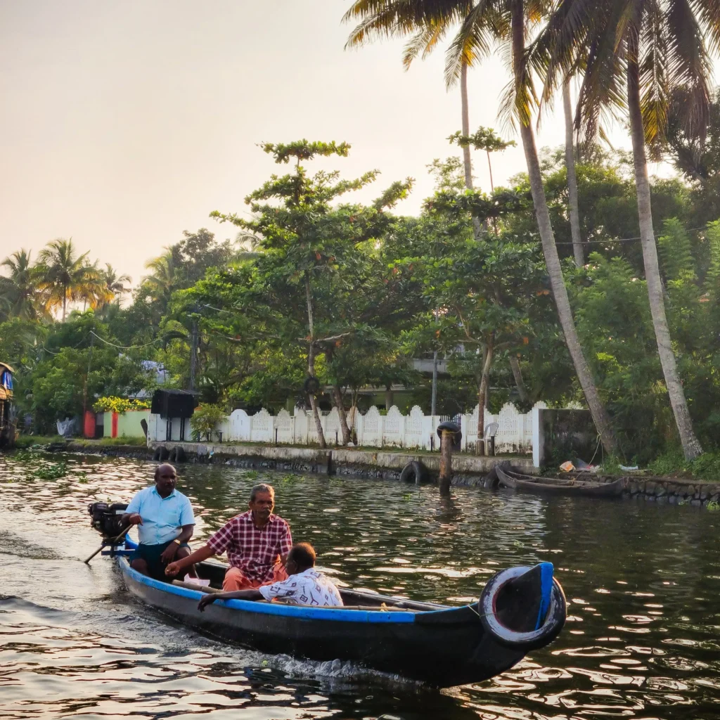 Traditional houseboat cruising through Kerala's backwaters, India